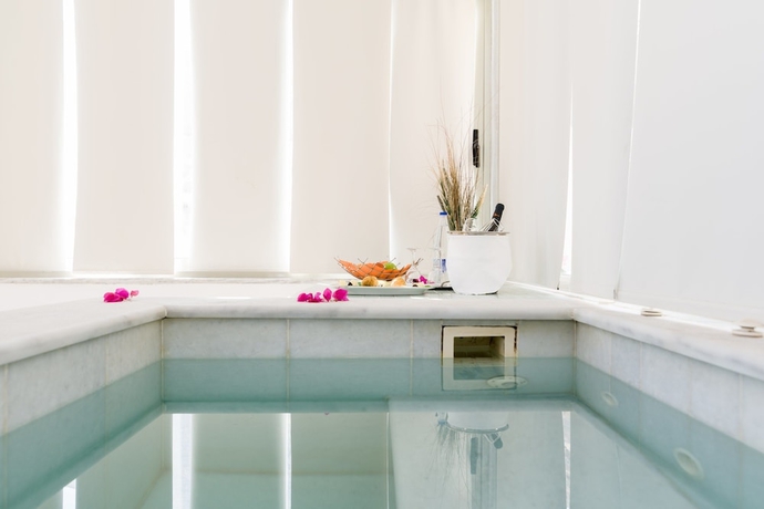 Imagen de la habitación del Hotel Antinea Suites and Spa. Foto 10