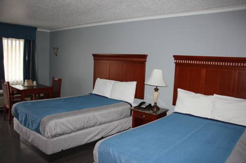 Imagen de la habitación del Hotel Antioch Quarters Inn and Suites. Foto 1