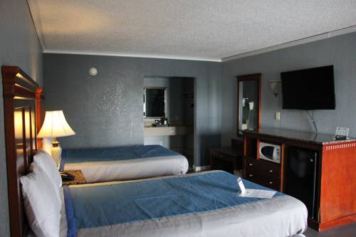 Imagen de la habitación del Hotel Antioch Quarters Inn and Suites. Foto 3