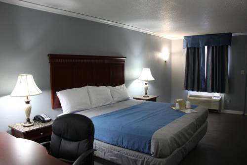 Imagen de la habitación del Hotel Antioch Quarters Inn and Suites. Foto 5