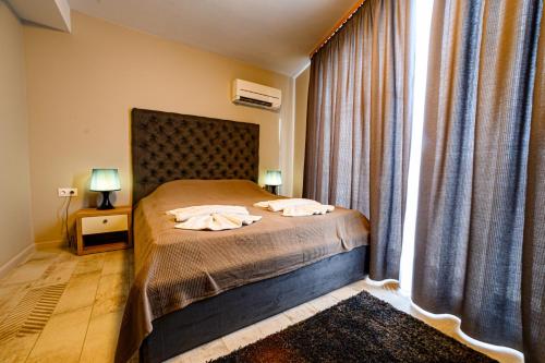 Imagen de la habitación del Hotel Antique Boutique. Foto 19