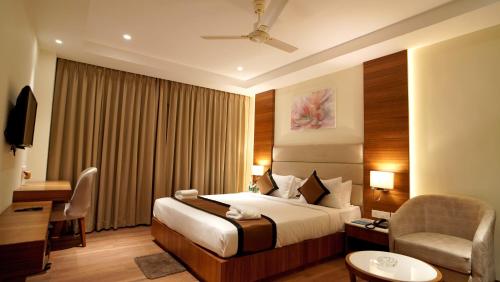 Imagen de la habitación del Hotel Antique Regency. Foto 17