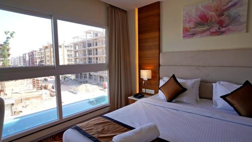 Imagen de la habitación del Hotel Antique Regency. Foto 18