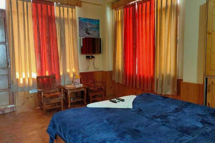 Imagen de la habitación del Hotel Antriksh Cottage Manali. Foto 15