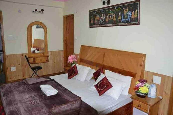 Imagen de la habitación del Hotel Antriksh Cottage Manali. Foto 18