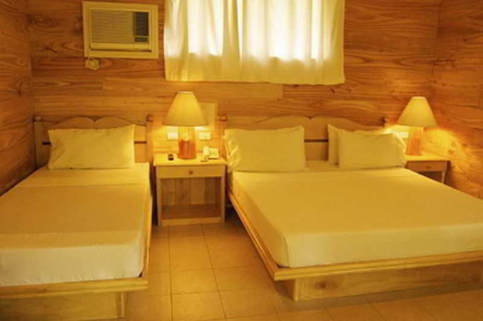 Imagen de la habitación del Hotel Antulang Beach Resort. Foto 10