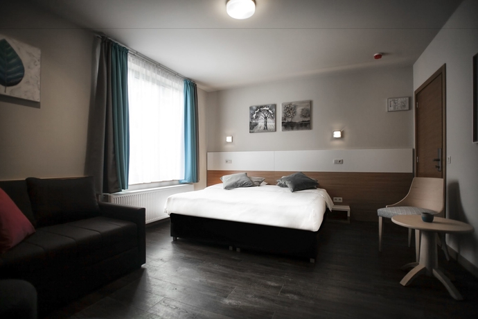 Imagen de la habitación del Hotel Antwerp Inn. Foto 3