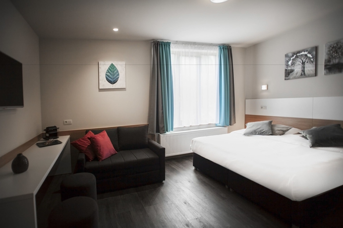 Imagen de la habitación del Hotel Antwerp Inn. Foto 6