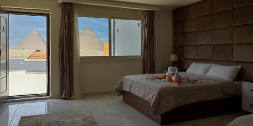 Imagen de la habitación del Hotel Anubis Retreat Pyramids View. Foto 17