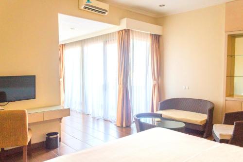 Imagen de la habitación del Hotel Anugrah. Foto 10