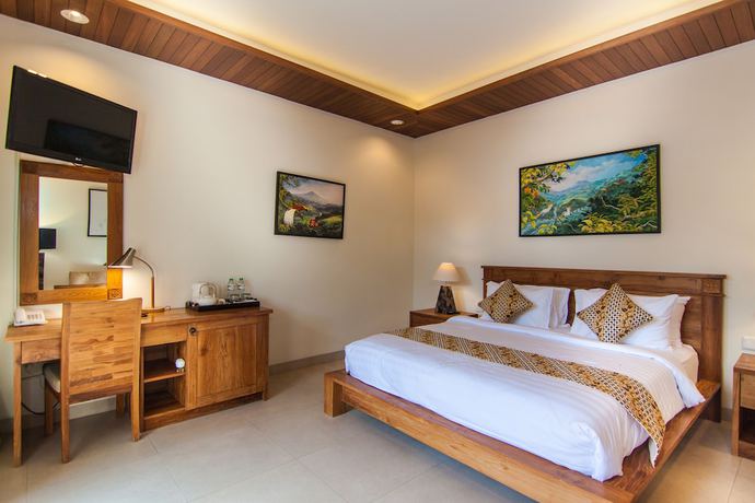 Imagen de la habitación del Hotel Anumana Village Ubud. Foto 11