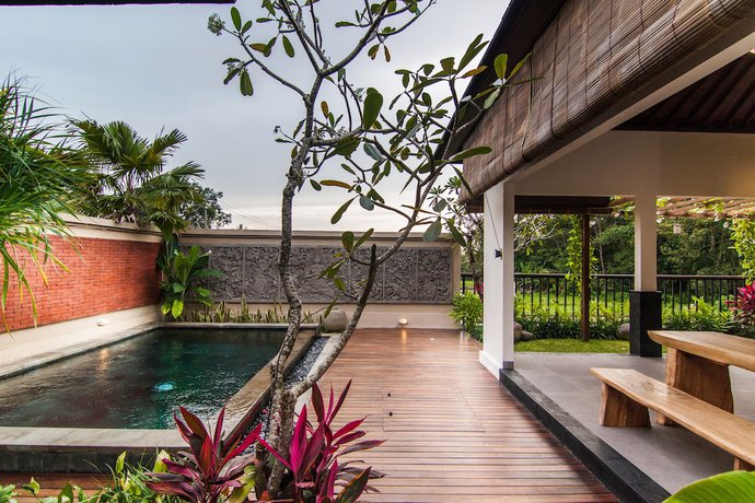 Imagen de la habitación del Hotel Anumana Village Ubud. Foto 14