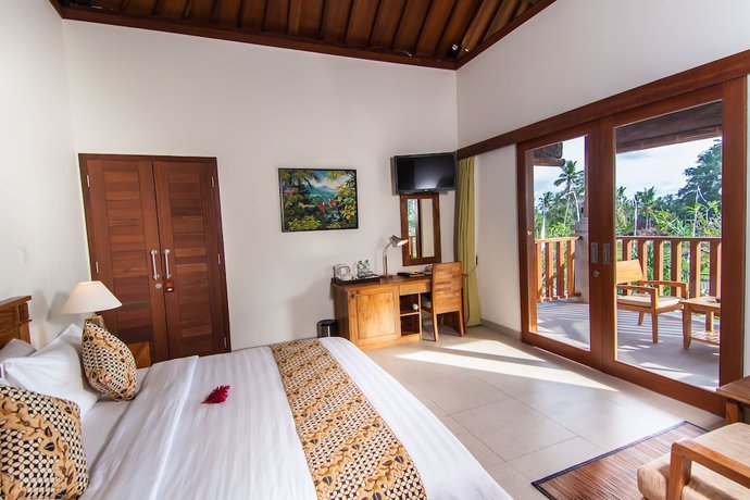 Imagen de la habitación del Hotel Anumana Village Ubud. Foto 15