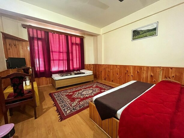 Imagen de la habitación del Hotel Anupam. Foto 16