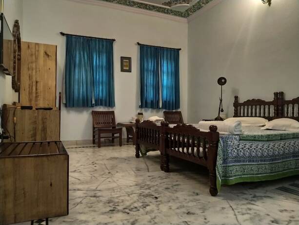 Imagen de la habitación del Hotel Anuraag Villa. Foto 19