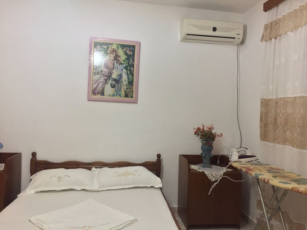 Imagen de la habitación del Hotel Anxhelo Apartments. Foto 6