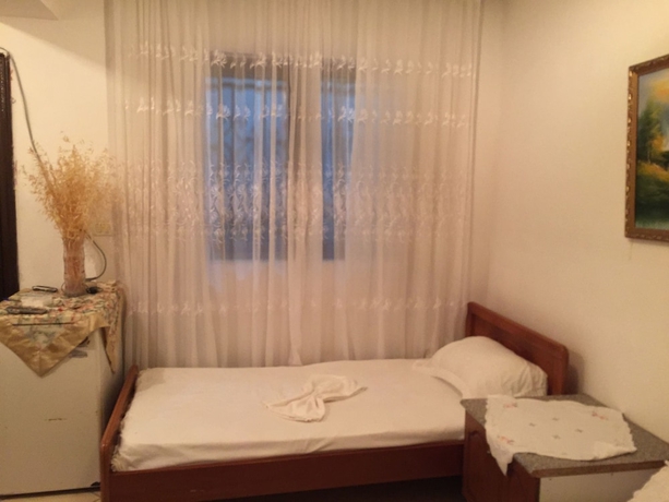 Imagen de la habitación del Hotel Anxhelo Apartments. Foto 10