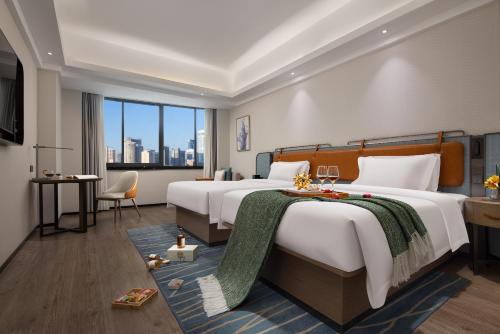 Imagen de la habitación del Hotel Anya - Changsha Wanjiali Square Metro Station. Foto 20