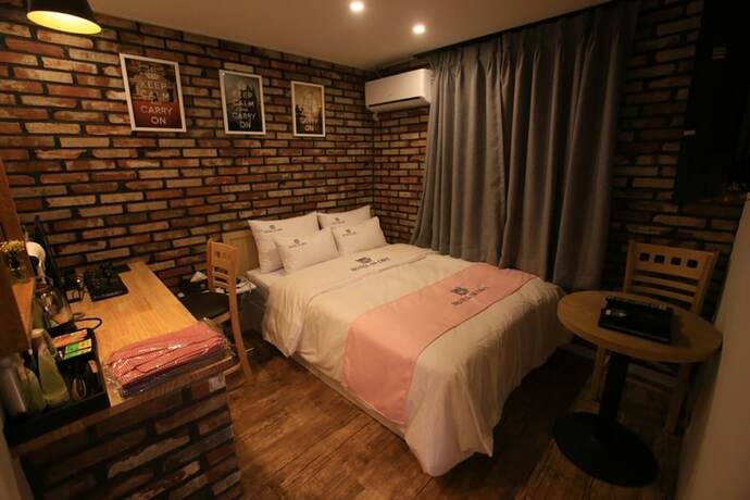 Imagen de la habitación del Hotel Anyang Cafe. Foto 16