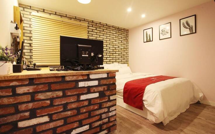 Imagen de la habitación del Hotel Anyang Cafe. Foto 18