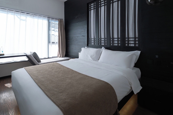 Imagen de la habitación del Hotel Anye Seaview Dali. Foto 2