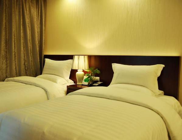 Imagen de la habitación del Hotel Anzhen Plaza Hotel - Beijing. Foto 3