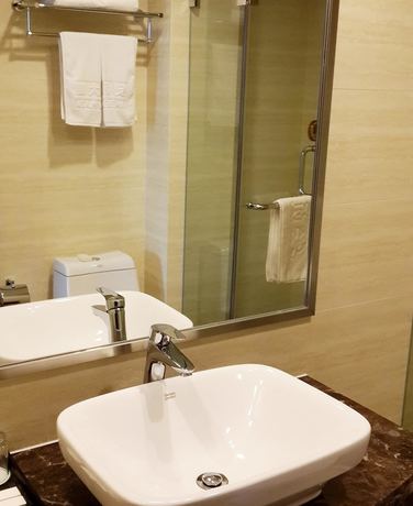 Imagen de la habitación del Hotel Anzhen Plaza Hotel - Beijing. Foto 8