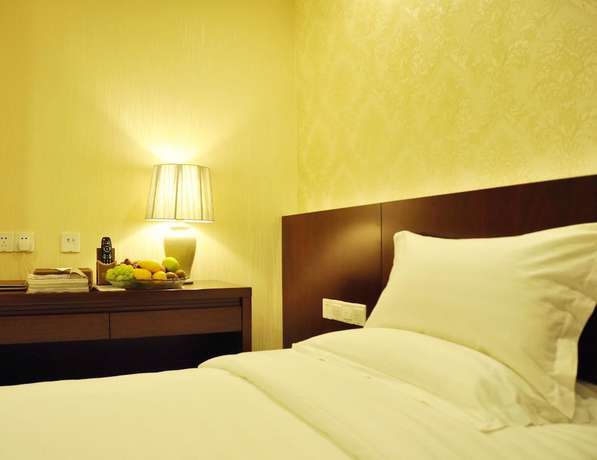 Imagen de la habitación del Hotel Anzhen Plaza Hotel - Beijing. Foto 11