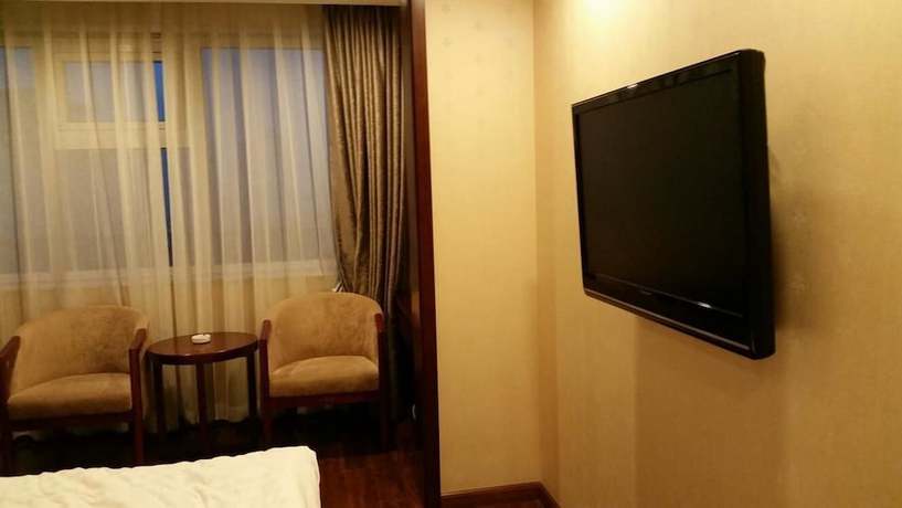 Imagen de la habitación del Hotel Anzhen Plaza Hotel - Beijing. Foto 12