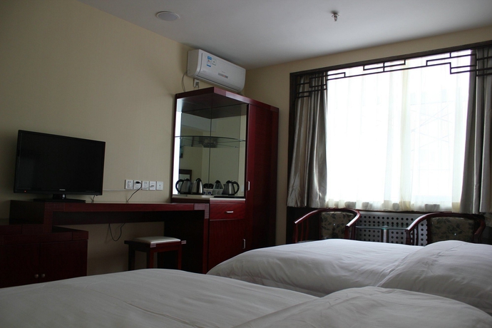Imagen de la habitación del Hotel Ao Xiang Ge. Foto 2