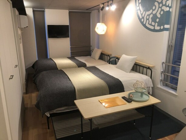 Imagen de la habitación del Hotel Aoca Sanno Apartment Of Contemporary Art. Foto 19