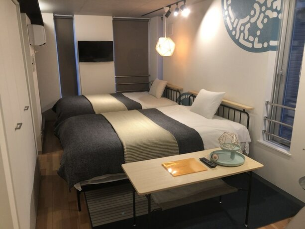 Imagen de la habitación del Hotel Aoca Sanno Apartment Of Contemporary Art. Foto 26
