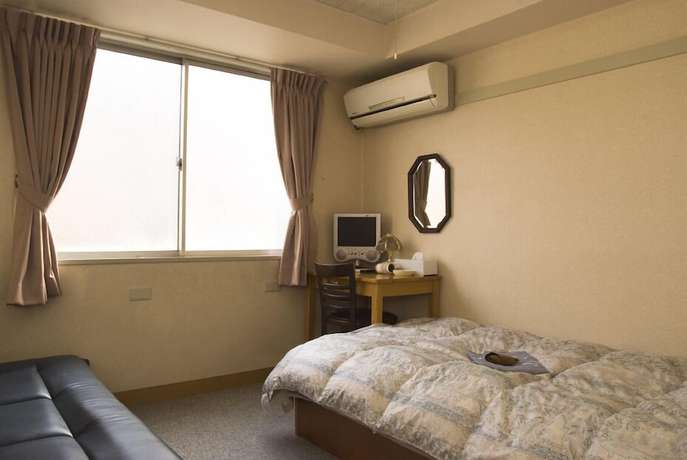 Imagen de la habitación del Hotel Aoi. Foto 10