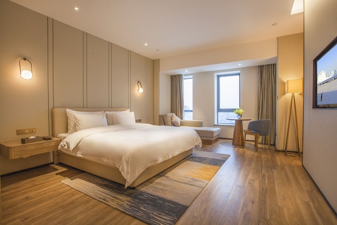 Imagen de la habitación del Hotel Aosheng Yiho. Foto 6