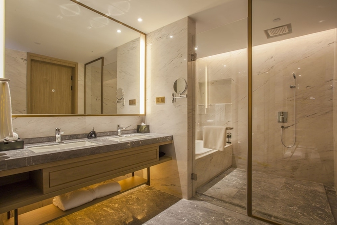 Imagen de la habitación del Hotel Aosheng Yiho. Foto 8