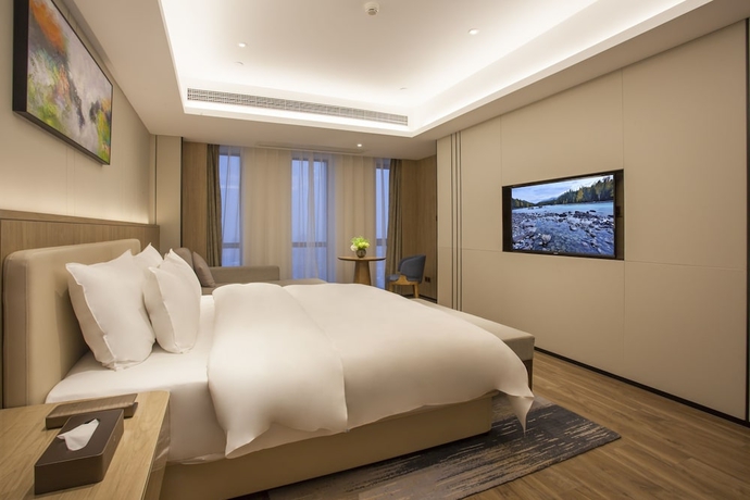 Imagen de la habitación del Hotel Aosheng Yiho. Foto 9