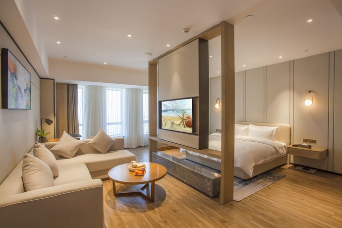 Imagen de la habitación del Hotel Aosheng Yiho. Foto 10