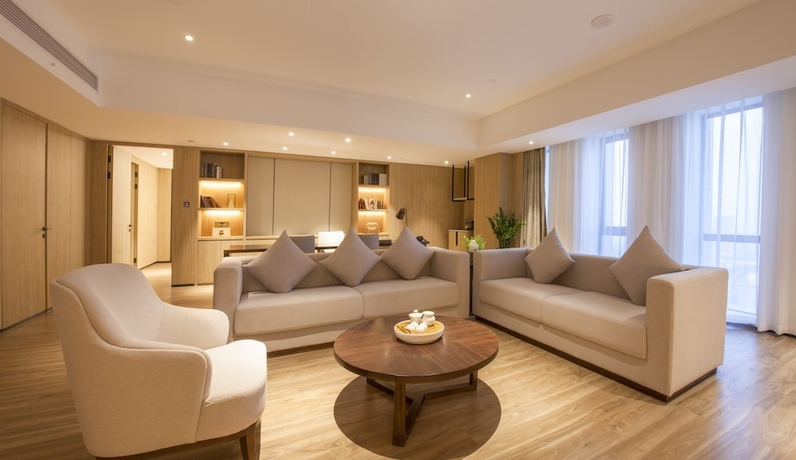 Imagen de la habitación del Hotel Aosheng Yiho. Foto 12