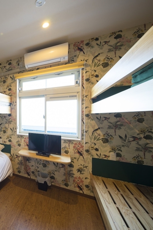 Imagen de la habitación del Hotel Aoshima Fisherman\'S Beachside Hostel and Spa. Foto 7