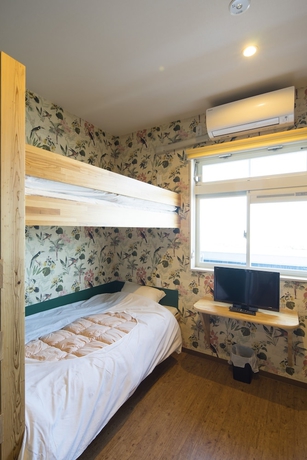 Imagen de la habitación del Hotel Aoshima Fisherman\'S Beachside Hostel and Spa. Foto 8