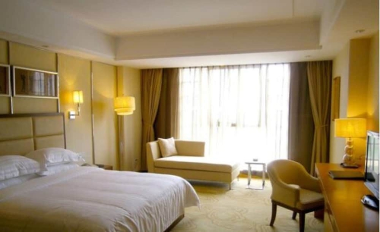 Imagen de la habitación del Hotel Aoyuan Golf. Foto 3