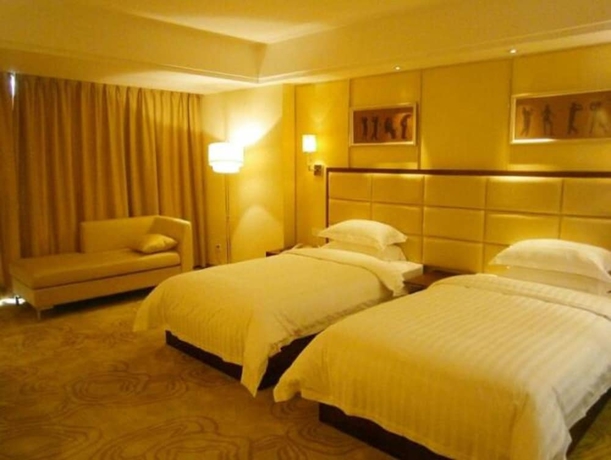 Imagen de la habitación del Hotel Aoyuan Golf. Foto 4