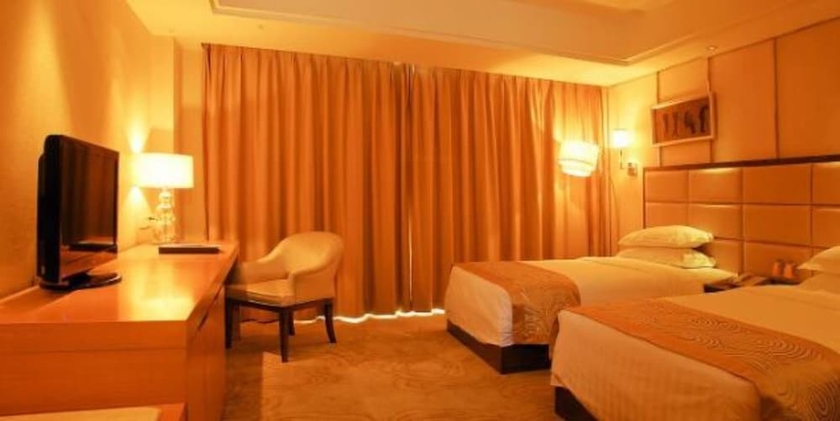 Imagen de la habitación del Hotel Aoyuan Golf. Foto 5