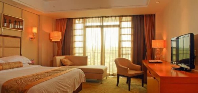 Imagen de la habitación del Hotel Aoyuan Golf. Foto 7