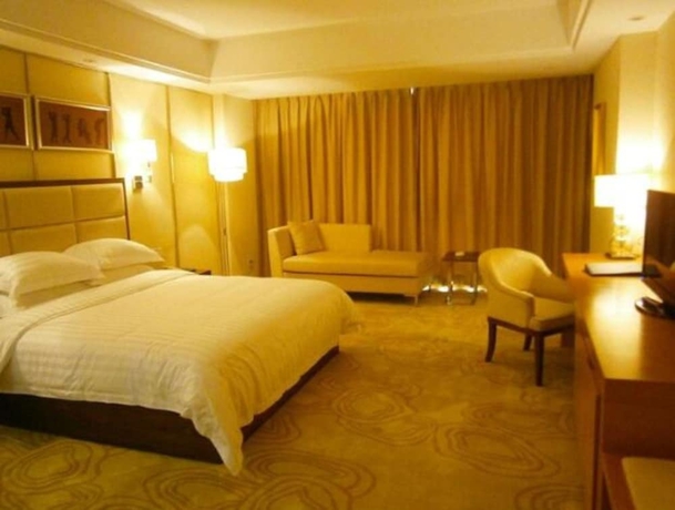Imagen de la habitación del Hotel Aoyuan Golf. Foto 10