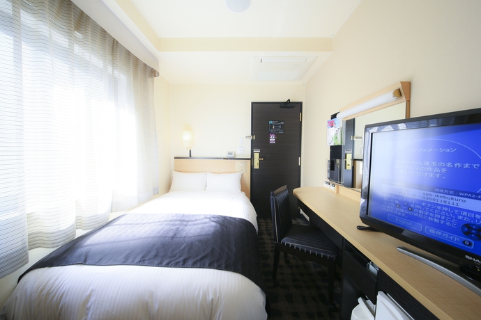 Imagen de la habitación del Hotel Apa Ikebukuro Station Kitaguchi. Foto 9