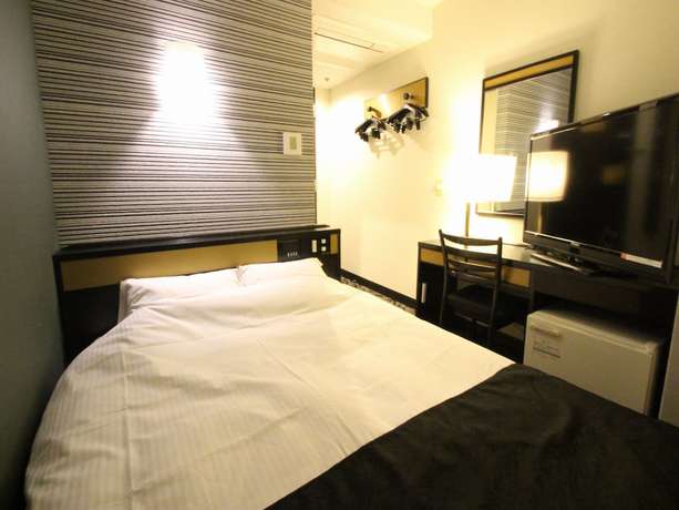 Imagen de la habitación del Hotel Apa Komatsu Grand. Foto 11