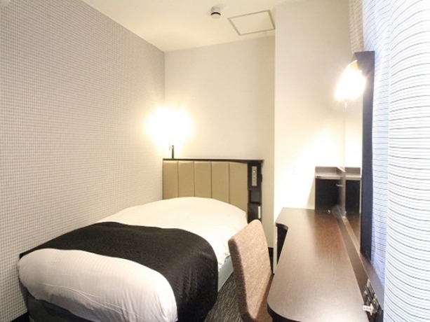 Imagen de la habitación del Hotel Apa Kumamoto Sakuramachi Bus Terminal Minami. Foto 6