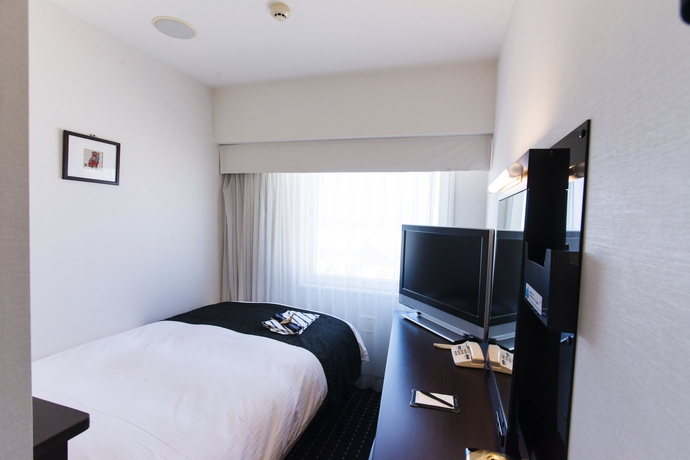 Imagen de la habitación del Hotel Apa Naha Matsuyama. Foto 3