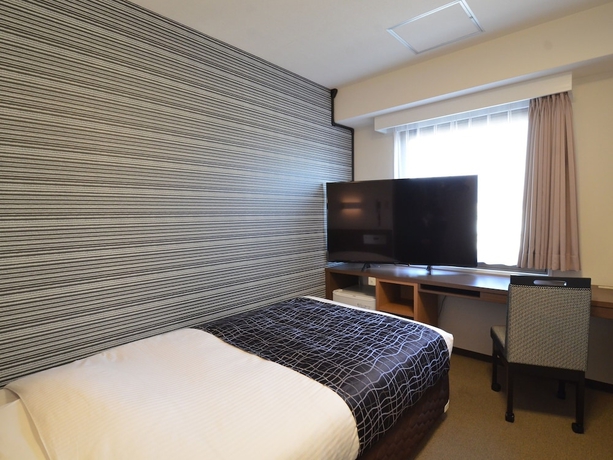Imagen de la habitación del Hotel Apa Osaka Kadomashi Ekimae. Foto 2